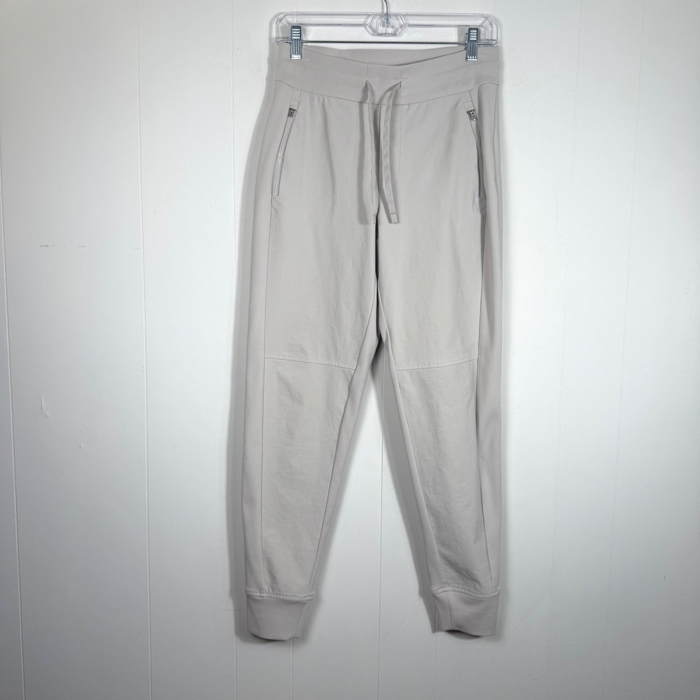 Athleta Headlands Hybrid Trek Joggers Abalone Beige Zip Pockets Size 2 486183-07